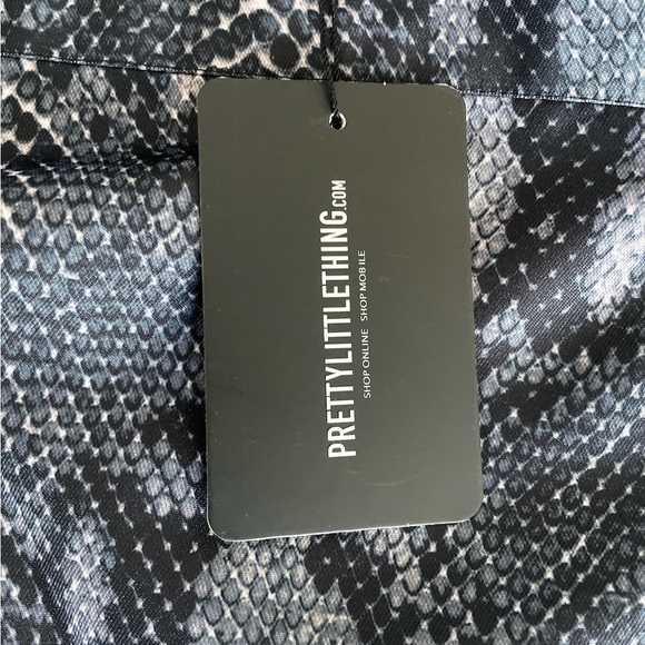 Brand new with tags snake print skirt with slit! - Picture 3 of 3